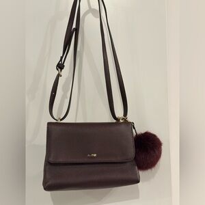 Aldo Burgundy Crossbody Bag with Pom Pom